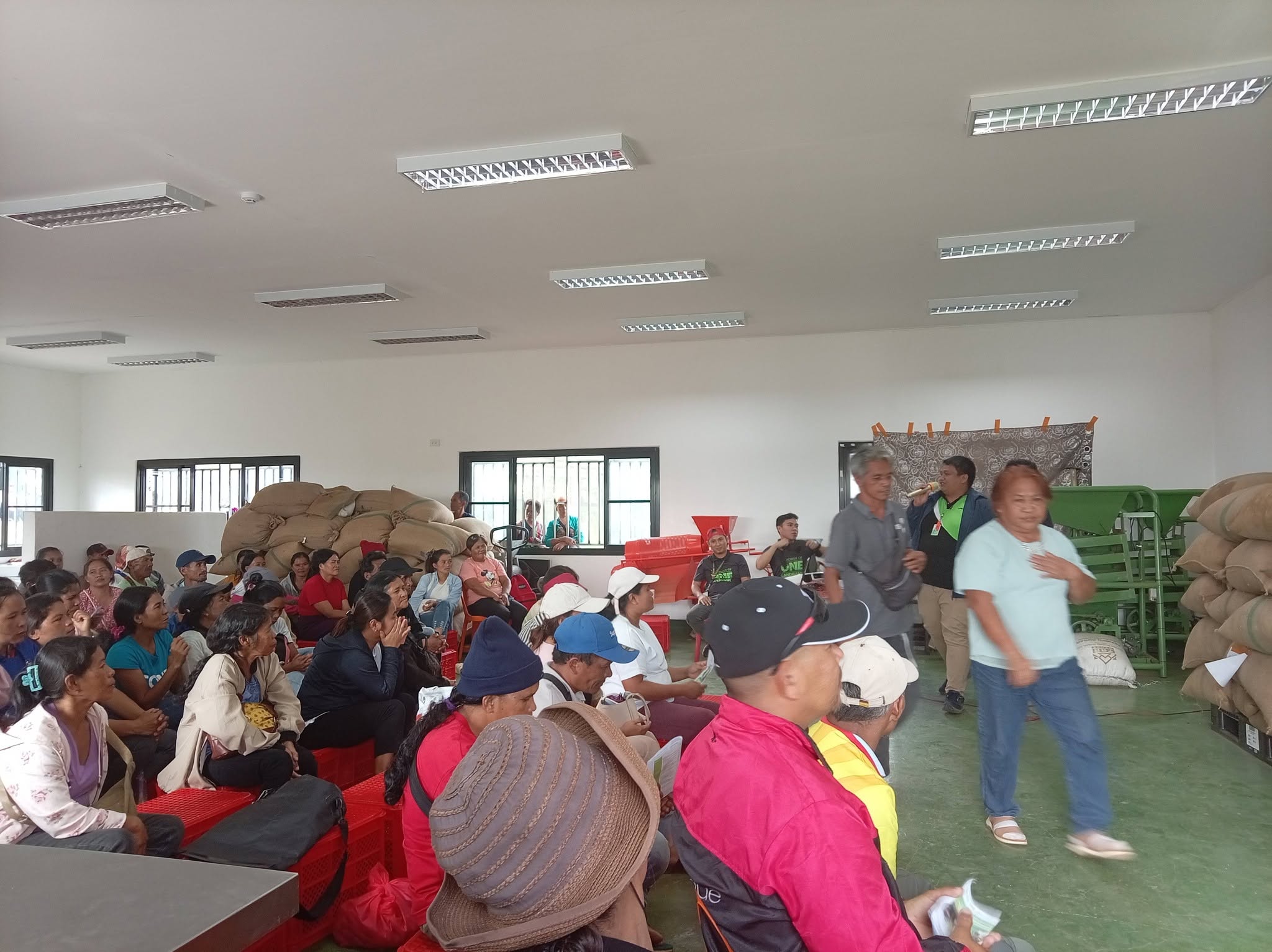 BMMPC farmers and community members gathered inside a cooperative facility